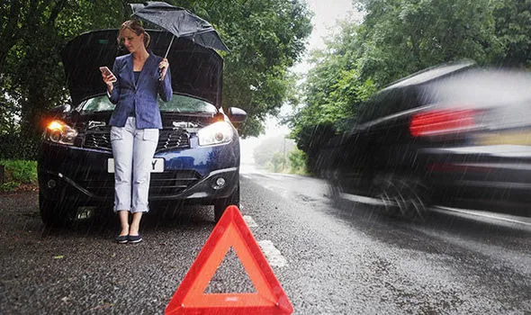 Driver waiting safely with hazard lights on